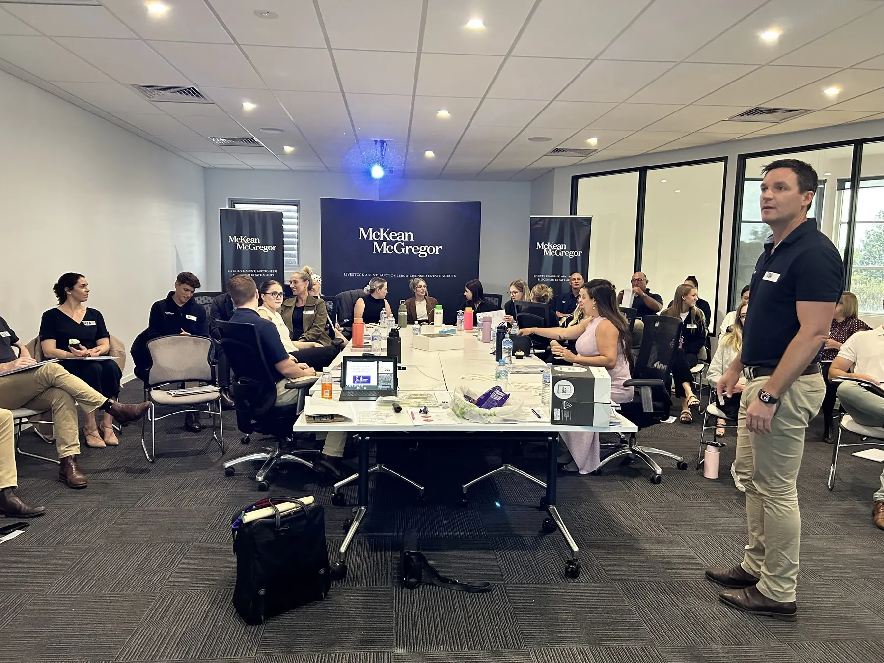 The McKean McGregor team in a goals workshop with Sue