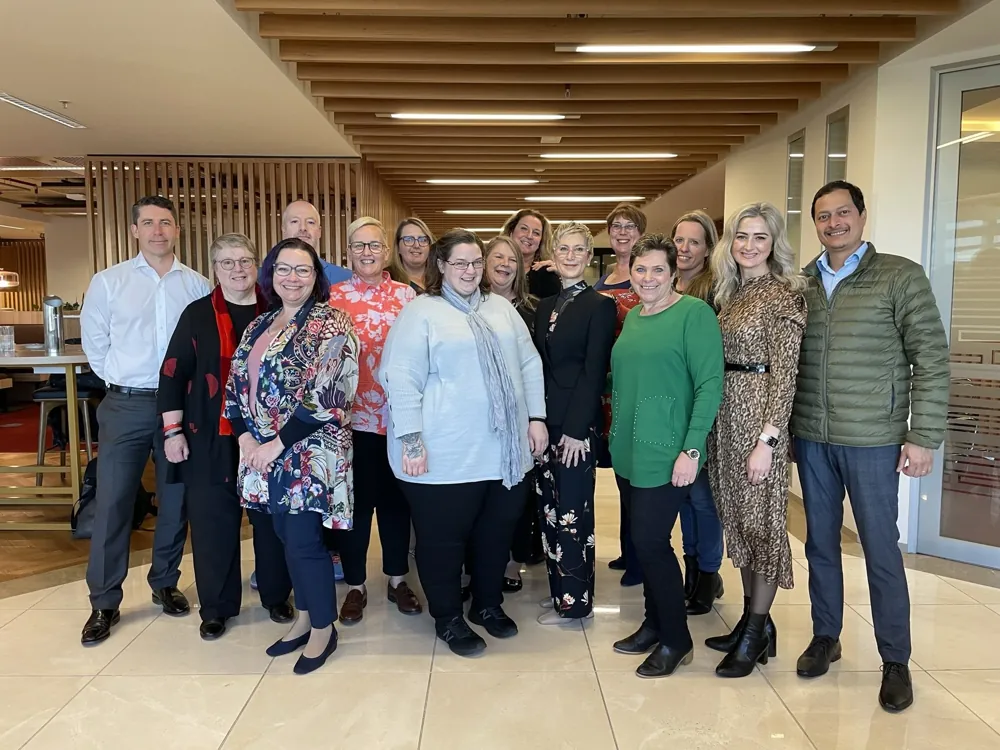 A team group photo after a workshop at 1 and One Consulting